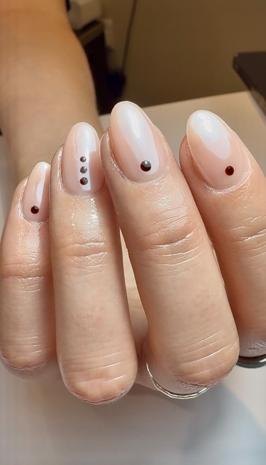 Blush natural nails with understated nail art